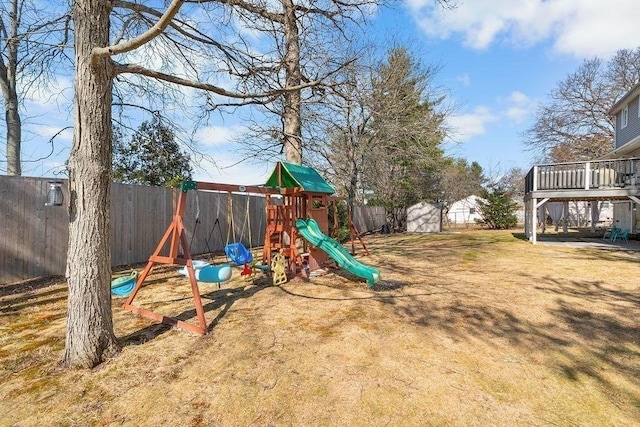 view of jungle gym with a fenced backyard