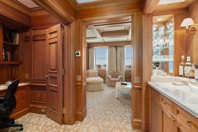 bathroom featuring wooden walls, ornamental molding, coffered ceiling, and beam ceiling