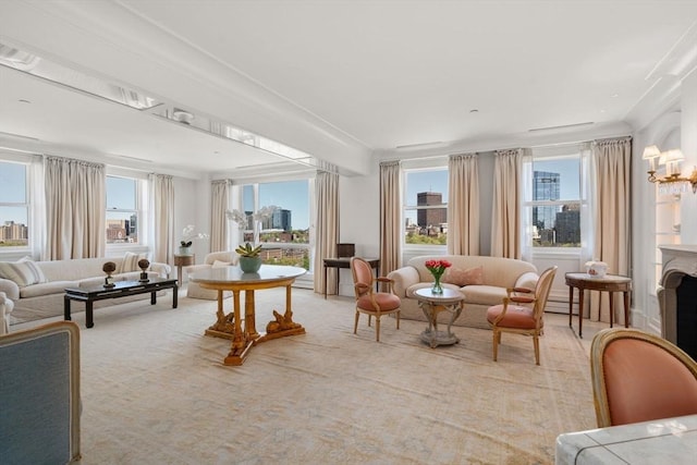 living room featuring a fireplace and a wealth of natural light