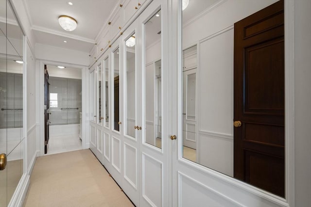 hallway featuring recessed lighting and ornamental molding