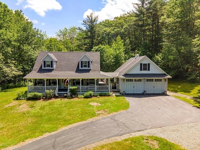 19 Orange Rd, Northfield, MA 01360 - view of front of home featuring a porch, asphalt driveway, a front lawn, and view of scattered trees