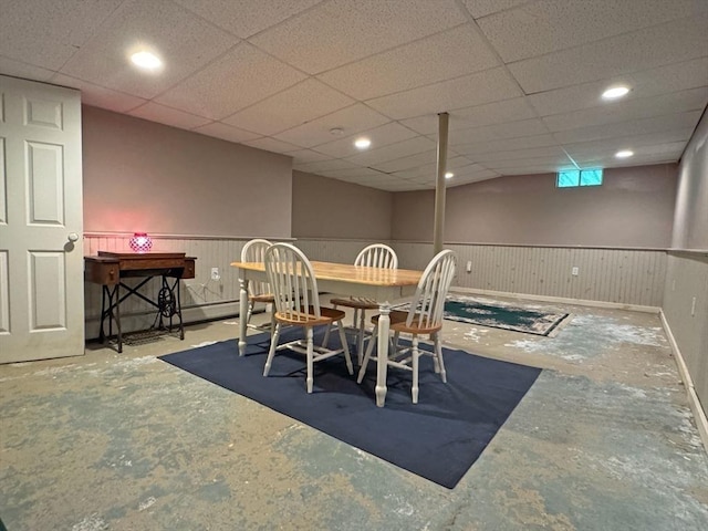 19 Orange Rd, Northfield, MA 01360 - dining space with unfinished concrete flooring, a wainscoted wall, and recessed lighting