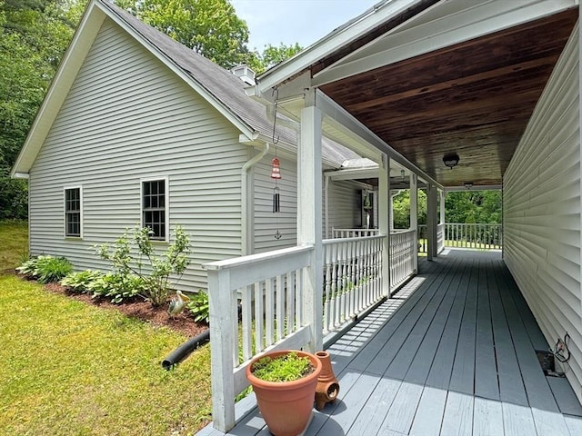 19 Orange Rd, Northfield, MA 01360 - wooden porch with a lawn