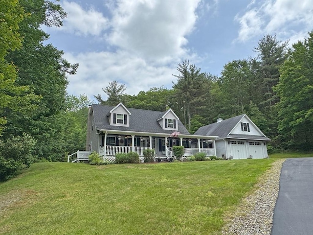 19 Orange Rd, Northfield, MA 01360 - cape cod home with a porch, a front yard, asphalt driveway, and a garage