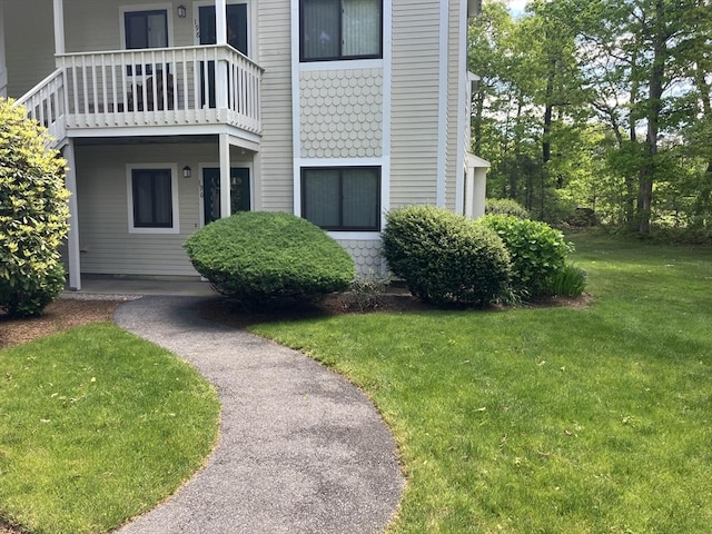 196 Eaton Ln Unit 196, Brewster, MA 02631 - view of side of home featuring a yard