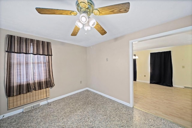 spare room featuring ceiling fan