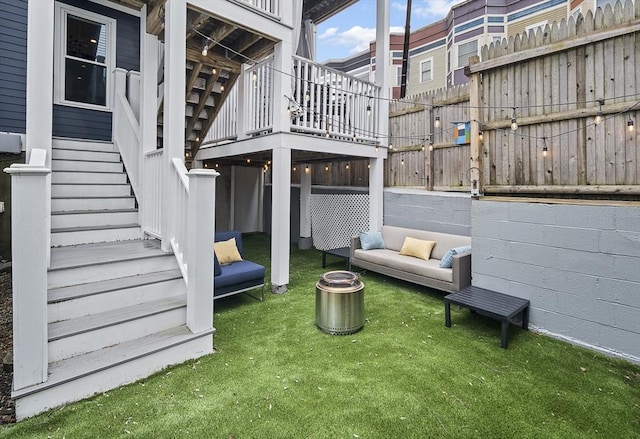 view of patio / terrace featuring stairway and a wooden deck