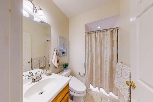 full bath featuring curtained shower, tile patterned flooring, vanity, and toilet