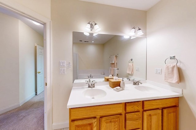 full bathroom with a sink, baseboards, and double vanity