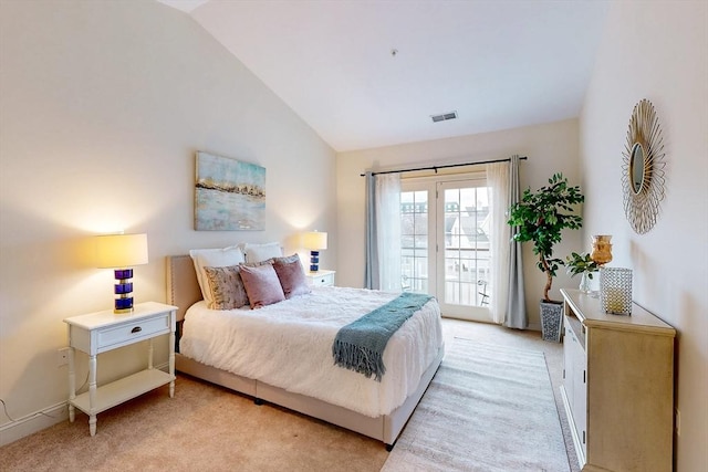 bedroom featuring lofted ceiling, access to exterior, visible vents, and light colored carpet