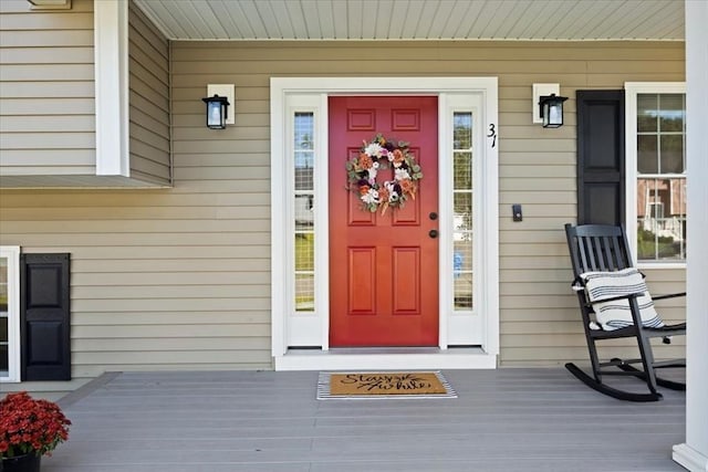 entrance to property with covered porch