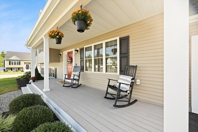 deck featuring covered porch