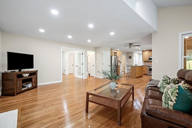 14 Nourse St, Westborough, MA 01581 - living area with light wood-style floors, recessed lighting, ceiling fan, and stairway