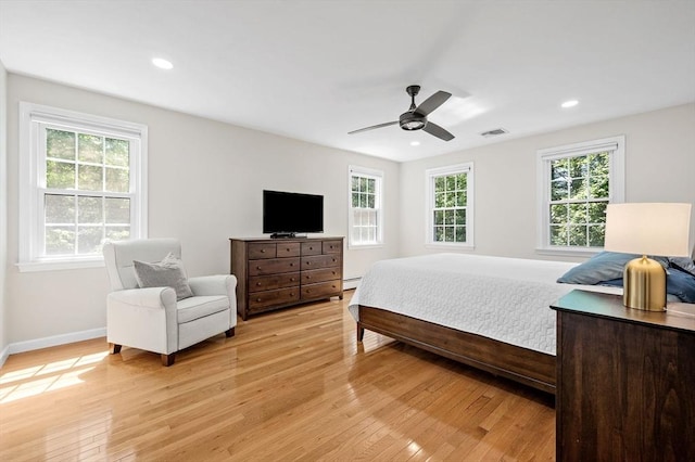 14 Nourse St, Westborough, MA 01581 - bedroom with light wood finished floors, baseboard heating, ceiling fan, and recessed lighting