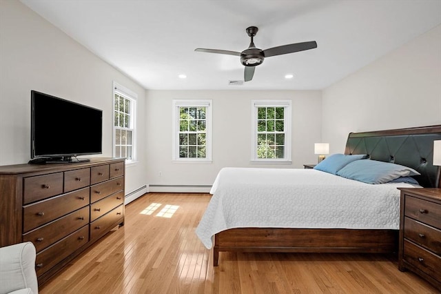 14 Nourse St, Westborough, MA 01581 - bedroom featuring multiple windows, light wood-style floors, a baseboard radiator, recessed lighting, and ceiling fan