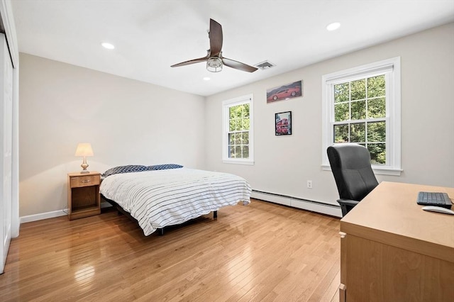 14 Nourse St, Westborough, MA 01581 - bedroom with a baseboard radiator, light wood finished floors, an office area, recessed lighting, and a ceiling fan