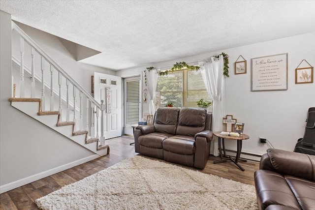 837 Partridgeville Rd Unit 2B, Athol, MA 01331 - living room with a textured ceiling, stairway, and wood finished floors