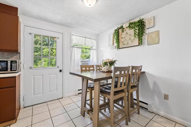 837 Partridgeville Rd Unit 2B, Athol, MA 01331 - dining area with light tile patterned floors and a textured ceiling