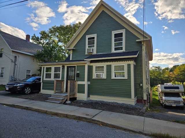 view of front property featuring cooling unit