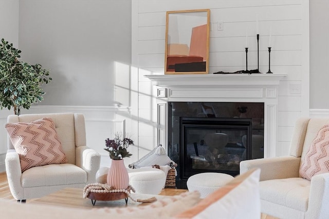 sitting room featuring hardwood / wood-style flooring