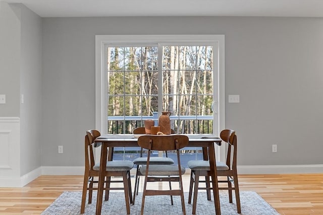 dining area with wood-type flooring