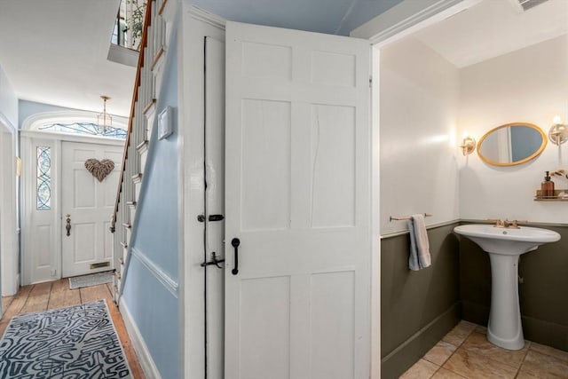 bathroom featuring tile patterned flooring