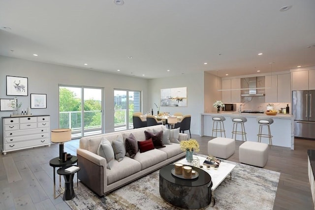 60 Newbury St Unit 10, Quincy, MA 02171 - living area with wood finished floors and recessed lighting