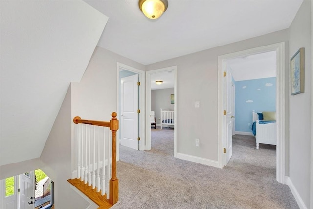 3 White Tail Dr, Tyngsborough, MA 01879 - corridor with an upstairs landing, carpet floors, and baseboards