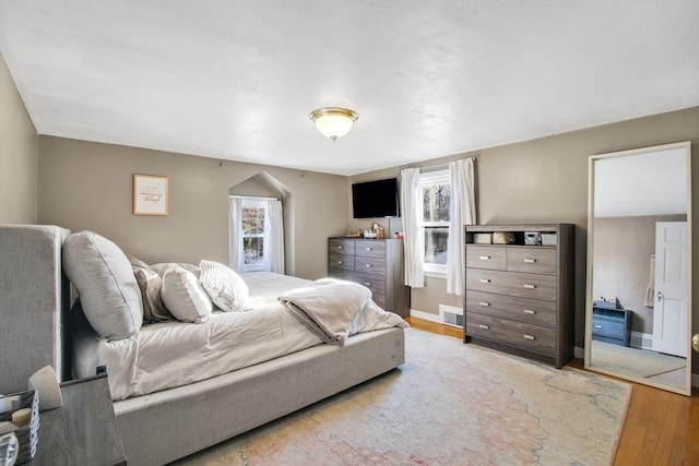 bedroom featuring light hardwood / wood-style floors