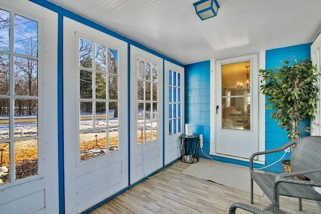 doorway with light hardwood / wood-style floors