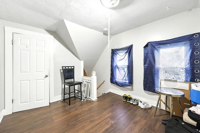 53 Euclid Ave, Springfield, MA 01108 - bonus room with wood finished floors, a textured ceiling, and vaulted ceiling