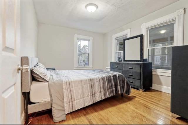 53 Euclid Ave, Springfield, MA 01108 - bedroom with light wood-style flooring and baseboards