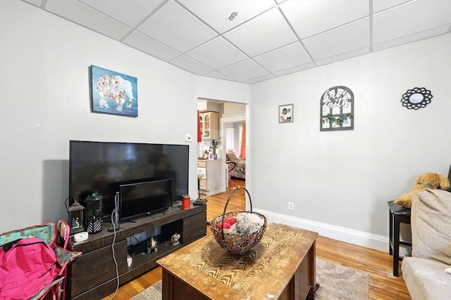53 Euclid Ave, Springfield, MA 01108 - living area featuring a paneled ceiling and light wood-style flooring