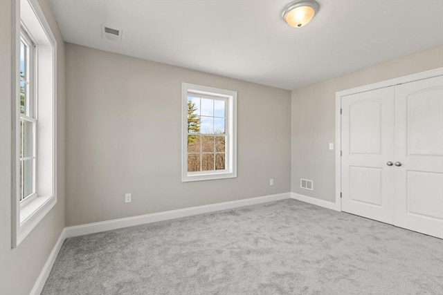 13R Pine Hill Way Unit 13, Harvard, MA 01451 - unfurnished bedroom with baseboards, visible vents, and carpet floors