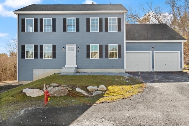13R Pine Hill Way Unit 13, Harvard, MA 01451 - colonial house featuring driveway, entry steps, a front lawn, and a garage