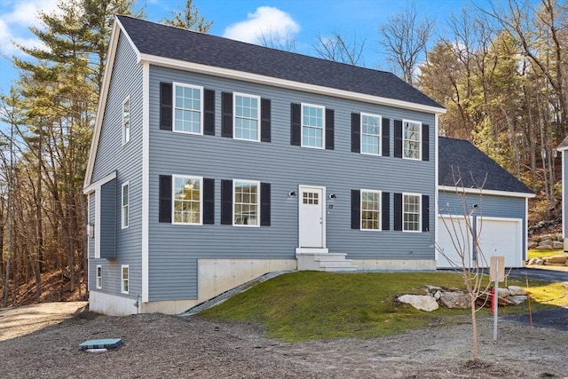 13R Pine Hill Way Unit 13, Harvard, MA 01451 - colonial home with driveway, a front lawn, entry steps, and an attached garage