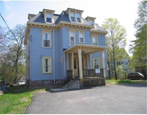 14 Bellevue St, Boston, MA 02125 - view of front facade featuring a porch