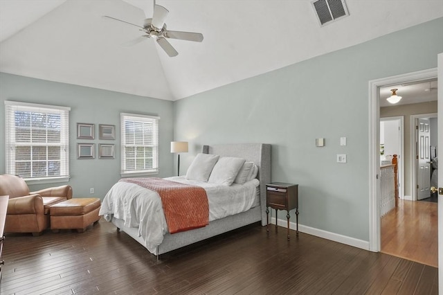 bedroom with visible vents, baseboards, high vaulted ceiling, and hardwood / wood-style flooring