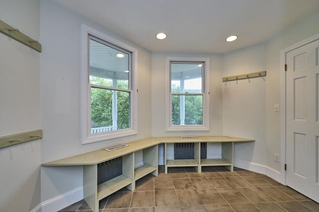 mudroom with baseboards, recessed lighting, and tile patterned flooring