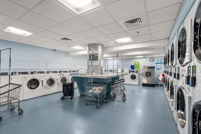 85 E India Row Unit 18B, Boston, MA 02110 - community laundry with estacked washer and dryer and washer and clothes dryer