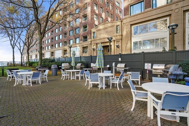 85 E India Row Unit 18B, Boston, MA 02110 - view of patio / terrace with outdoor dining space and grilling area