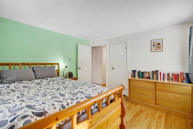 bedroom with light hardwood / wood-style flooring