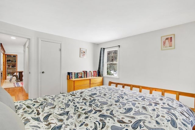 bedroom with hardwood / wood-style flooring