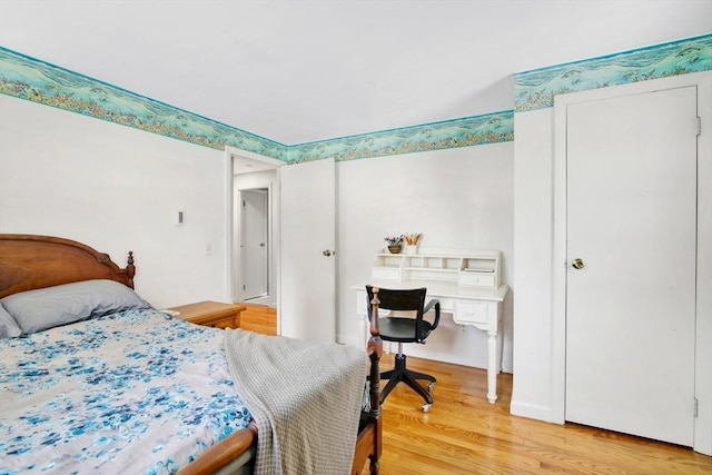 bedroom featuring hardwood / wood-style flooring