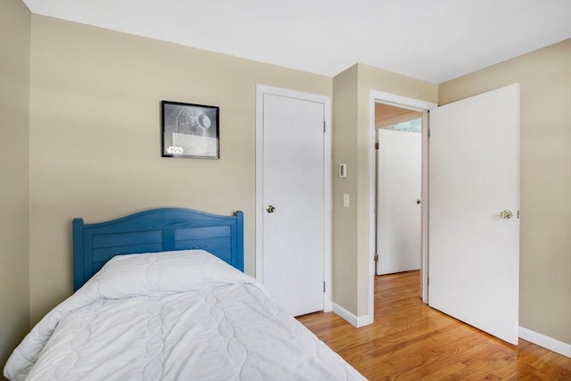 bedroom featuring hardwood / wood-style flooring