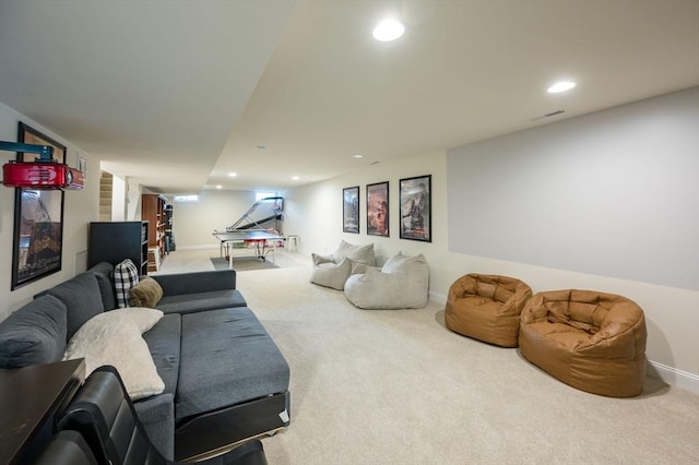 living area featuring visible vents, recessed lighting, baseboards, and carpet floors