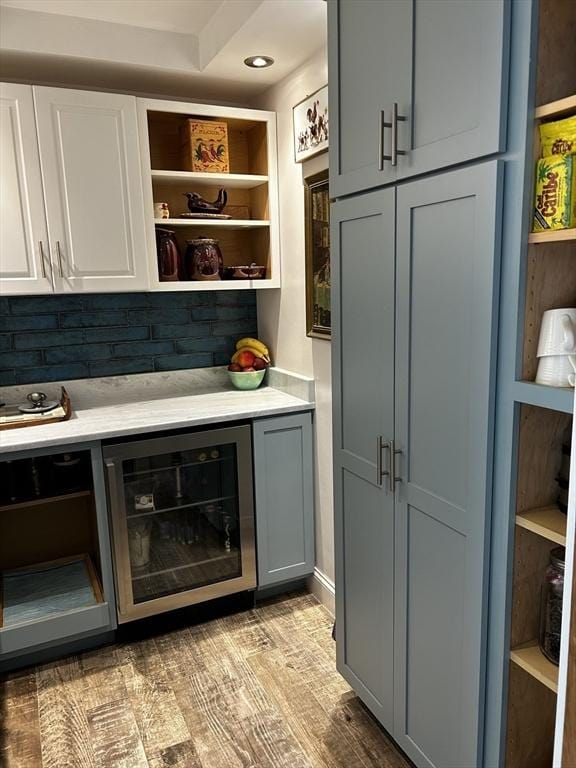 16 Pinehurst Ave, Dracut, MA 01826 - indoor dry bar featuring wine cooler and light wood-style flooring