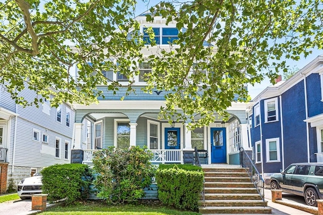232 Powder House Blvd Unit 232, Somerville, MA 02144 - view of front of property featuring a porch