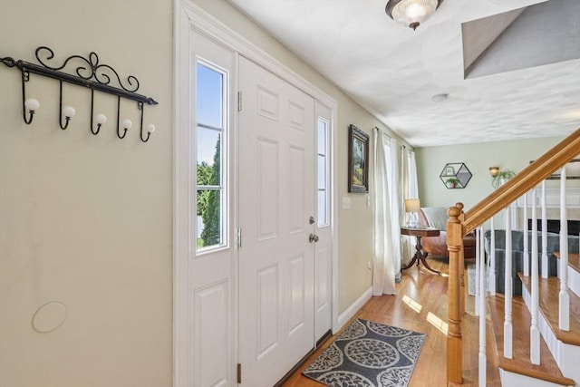 3 Trophy Ave, Townsend, MA 01469 - entryway featuring healthy amount of natural light, wood finished floors, stairway, and baseboards