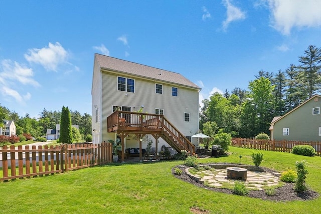 3 Trophy Ave, Townsend, MA 01469 - rear view of house with a fire pit, a wooden deck, and stairs